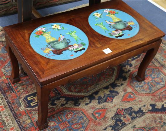 A Chinese table with two inset enamel plaques, W.82cm